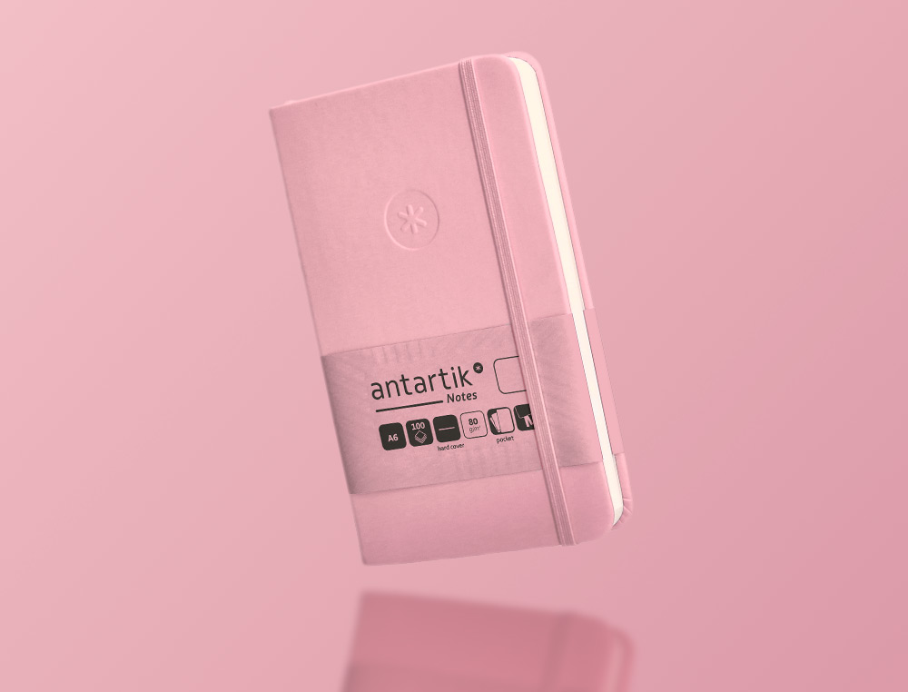 CUADERNO CON GOMILLA ANTARTIK NOTES TAPA DURA A6 HOJAS LISAS ROSA PASTEL 100 HOJAS 80 GR FSC