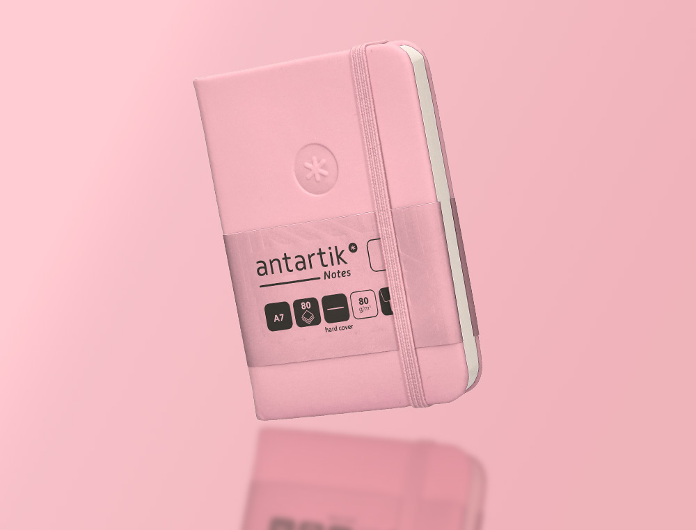 CUADERNO CON GOMILLA ANTARTIK NOTES TAPA DURA A7 HOJAS LISAS ROSA PASTEL 80 HOJAS 80 GR FSC