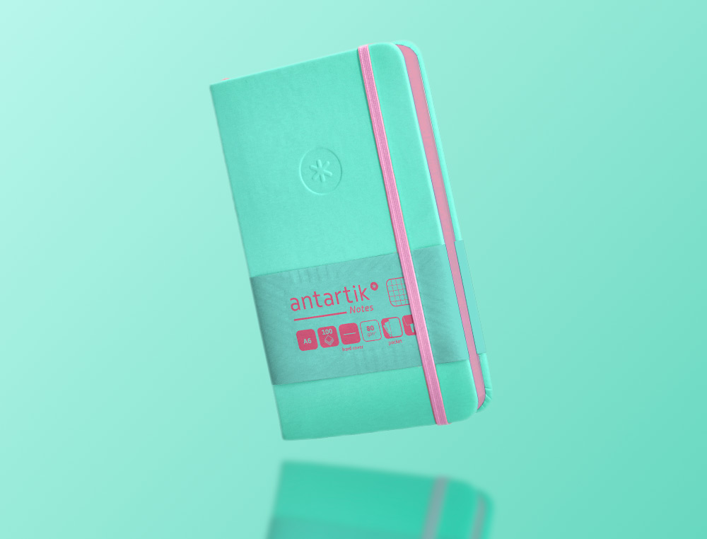 CUADERNO CON GOMILLA ANTARTIK NOTES TAPA DURA A6 HOJAS CUADRICULA ROSA Y TURQUESA 100 HOJAS 80 GR FSC
